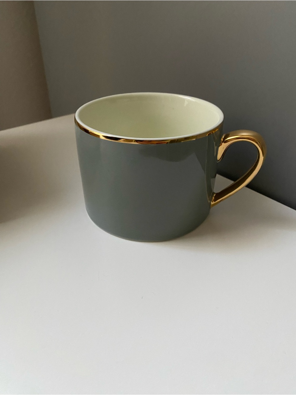 H&M GRAY PORCELAIN CUP WITH GOLD RIM NEW
